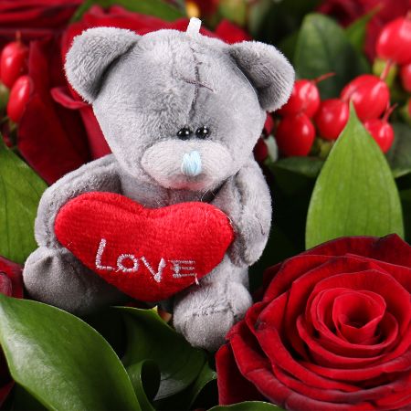 hypericum, ruscus (10 pcs.), teddy bear, rose (11 pcs.), packaging, ribbon